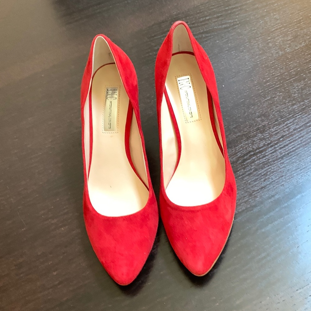 Red suede pumps